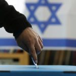 Tired voters in Israel in limbo go to voting for third time in year