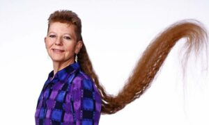 A Tennessee woman breaks the record for the longest mullet ever
