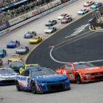 NASCAR Cup Series cars racing at Bristol Motor Speedway during the Food City 500