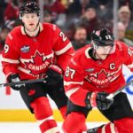 Hockey players in action during the IIHF World Championship 2025 match in Stockholm, Sweden