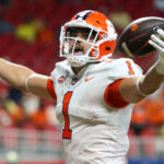 showing 2025–26 college football bowl game schedule with dates, times, and TV networks