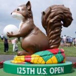 Golfers competing at Oakmont Country Club during the 2025 U.S. Open tournament