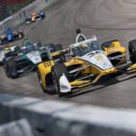 IndyCar drivers racing under lights at Iowa Speedway during the 2025 doubleheader weekend