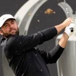 Scottie Scheffler tees off at Royal Portrush during the final round of the 2025 Open Championship Sources Ask ChatGPT