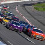 NASCAR cars racing at Daytona International Speedway during the August 2025 Cup Series and Xfinity Series events