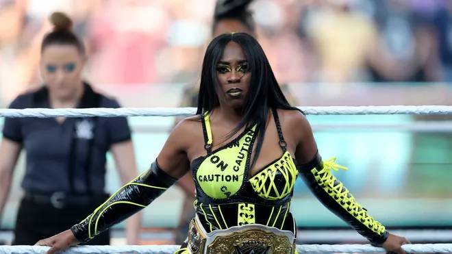 WWE Star Naomi Relinquishes Women’s World Title After Pregnancy Reveal