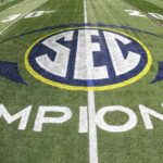 SEC Championship Game trophy with Alabama and Georgia past winners